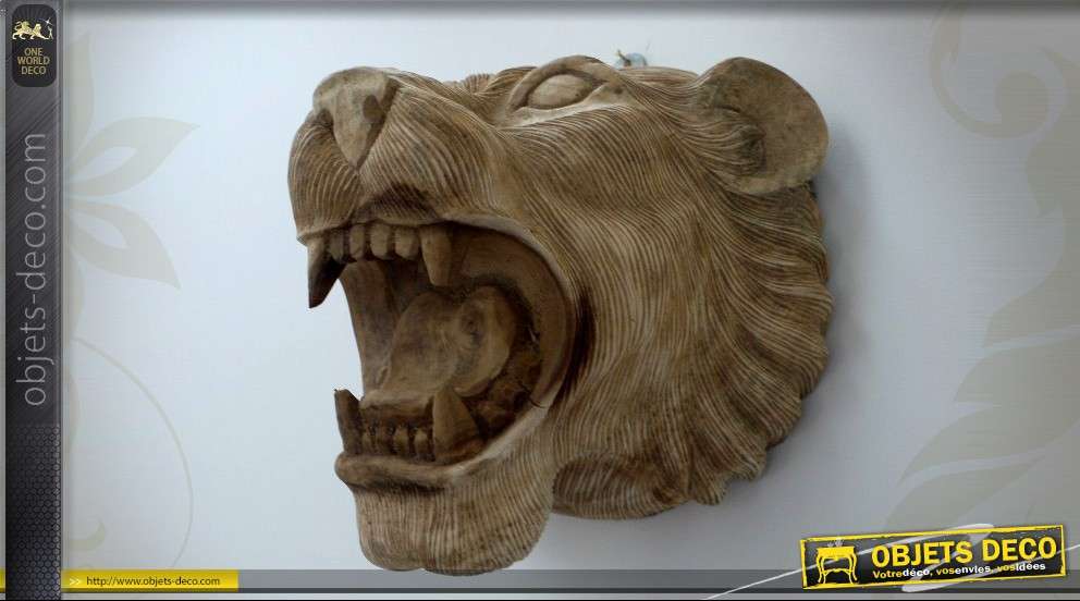 Sculpture en bois représentant une tête de lion