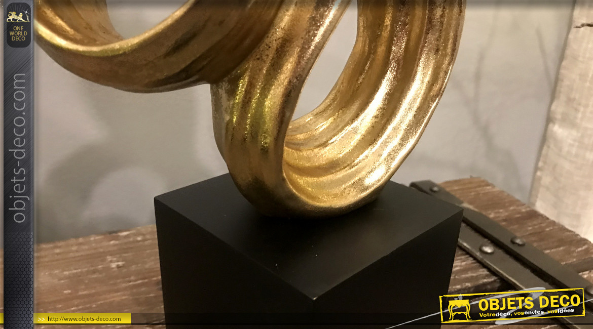 Trophée de style abstrait en résine finition noir et doré, 49cm