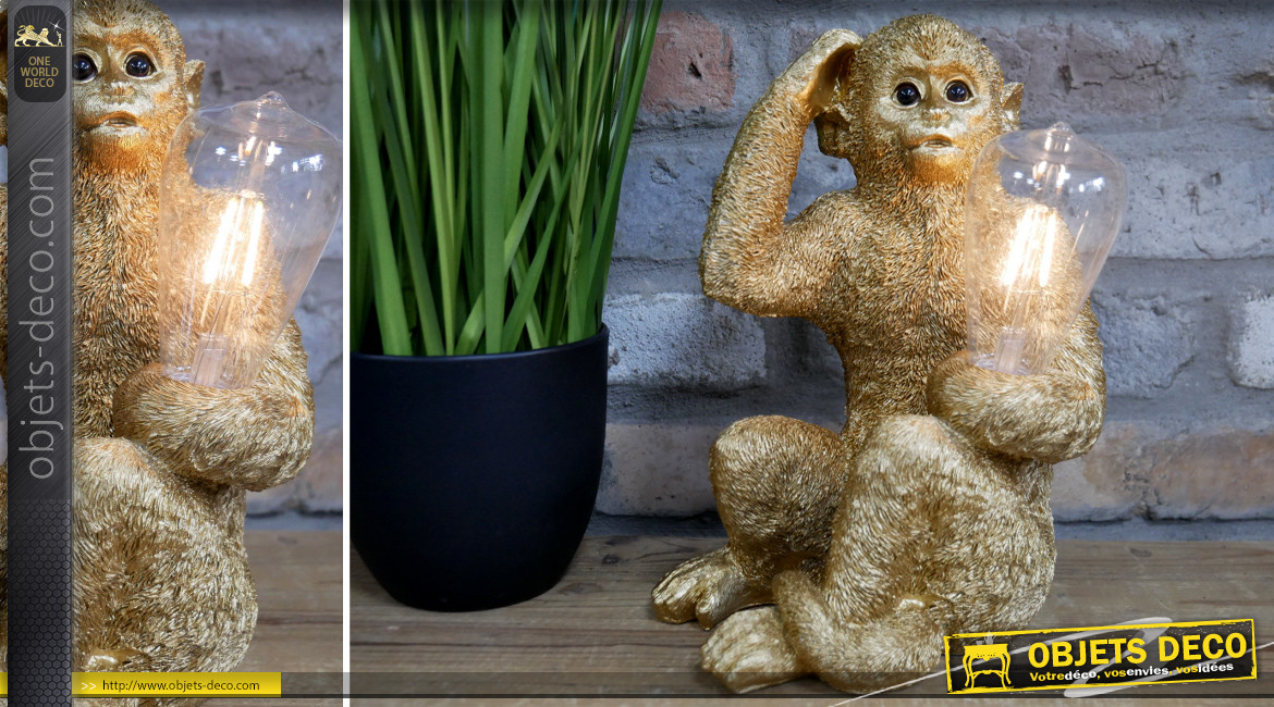 Sculpture lumineuse d'un singe en résine finition doré ancien, effet réaliste, 28cm