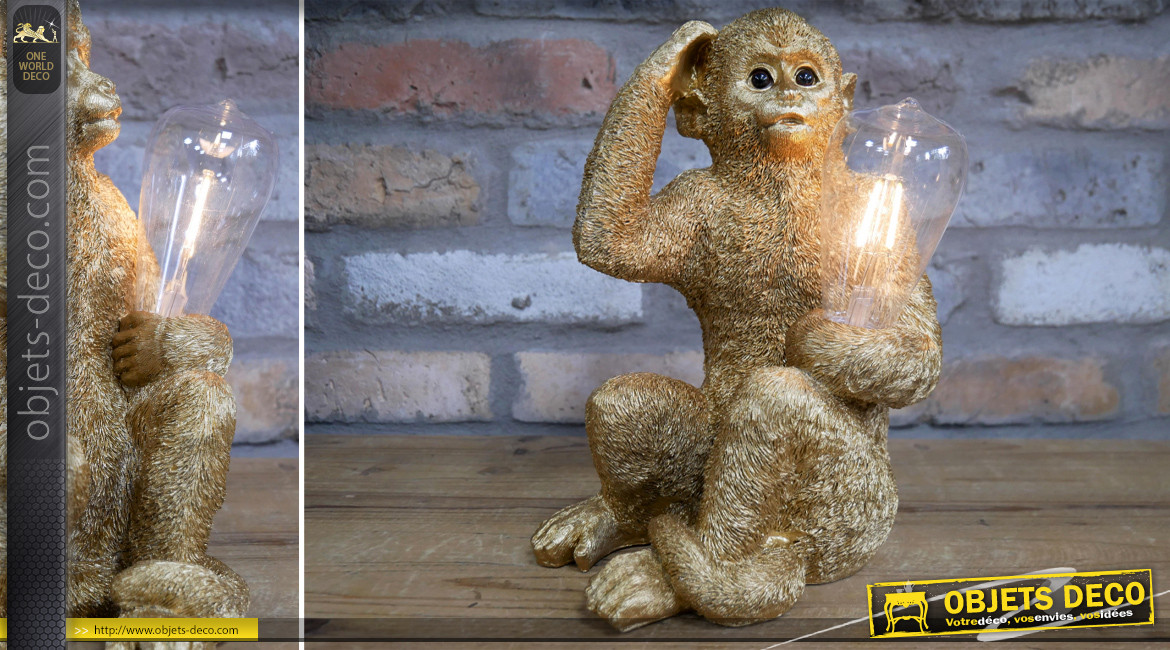 Sculpture lumineuse d'un singe en résine finition doré ancien, effet réaliste, 28cm