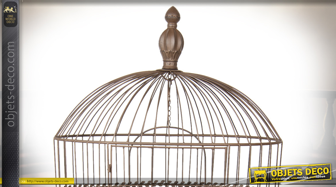 Grande cage à oiseau décorative sur pied, de forme ovale, finition cuivre vieilli, 142cm