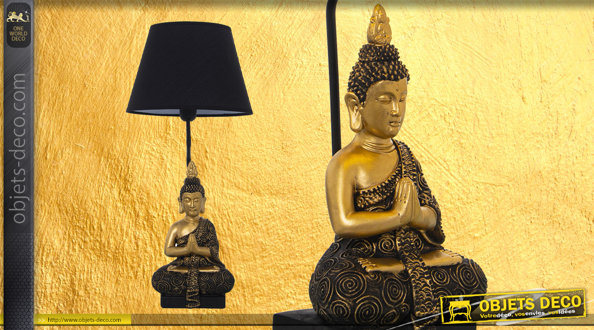 Lampe de salon avec sculpture de bouddha, finition noir et or, ambiance zen chic, 60cm