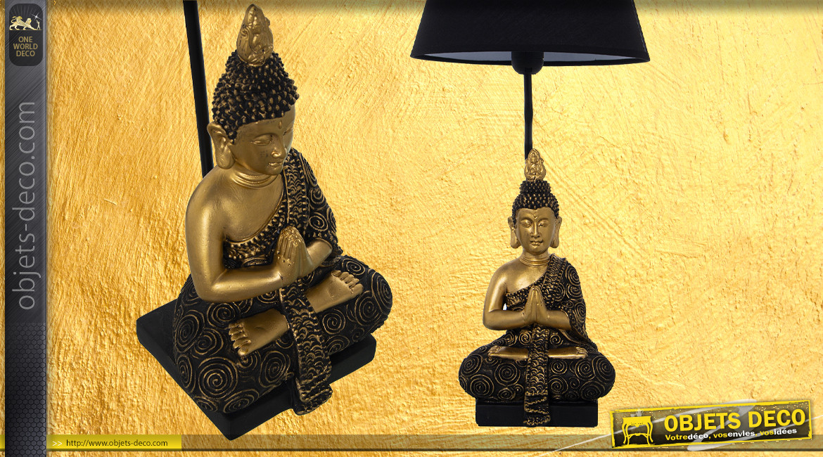 Lampe de salon avec sculpture de bouddha, finition noir et or, ambiance zen chic, 60cm