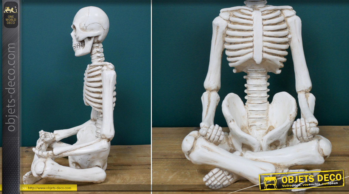 Représentation d'un squelette humain en résine, position de yoga, finition blanc osseux, 35cm
