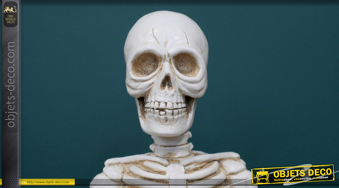 Représentation d'un squelette humain en résine, position de yoga, finition blanc osseux, 35cm