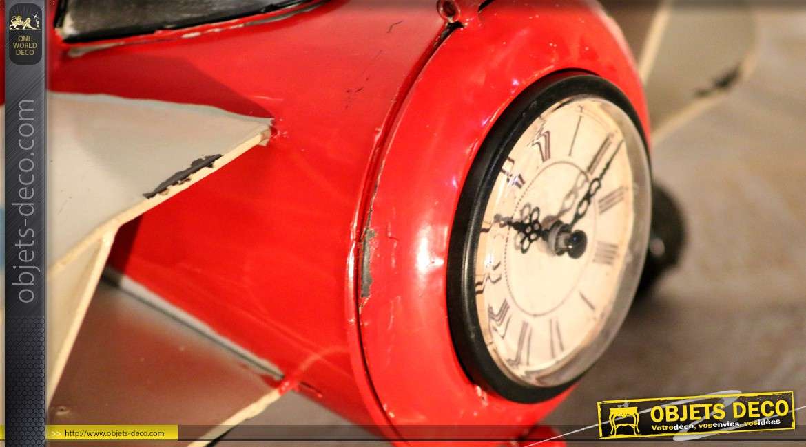 Horloge vintage en forme d'avion