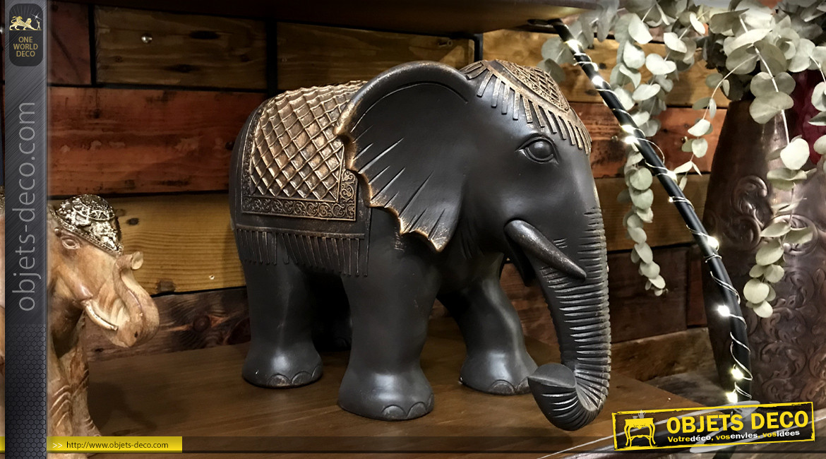 Statuette d'éléphant harnaché coloris ébène et or 37,5 cm