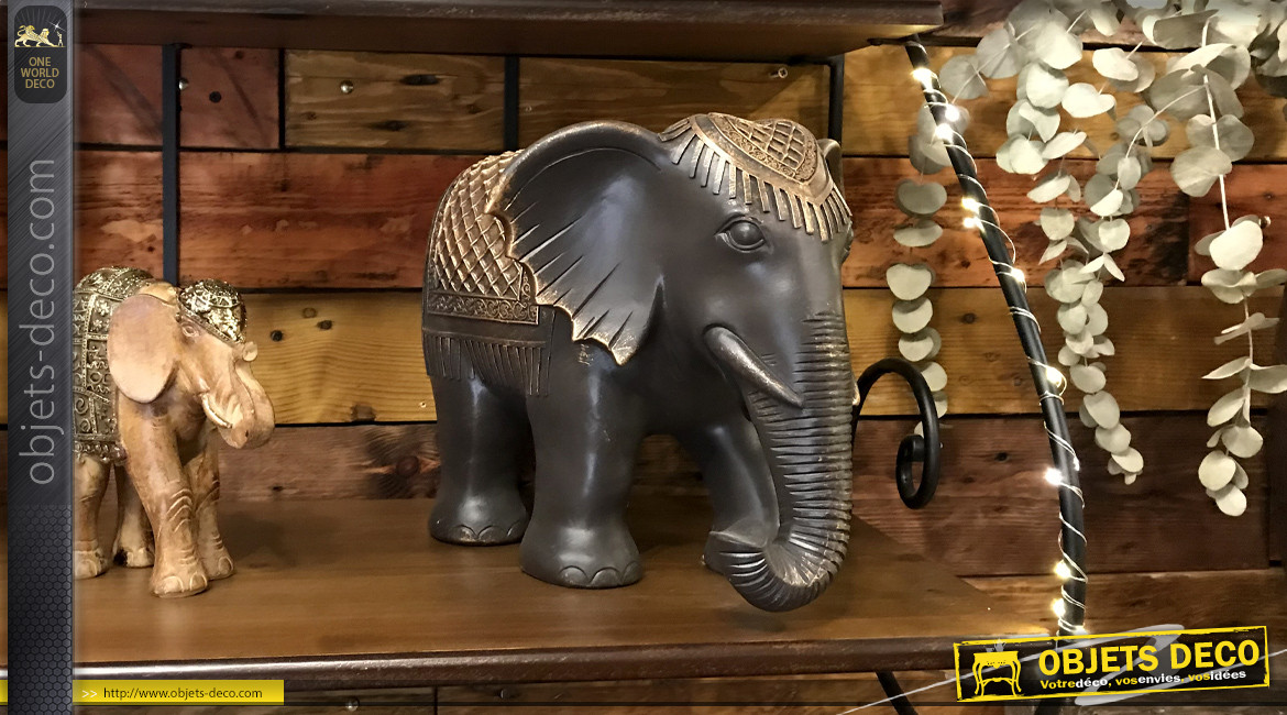 Statuette d'éléphant harnaché coloris ébène et or 37,5 cm