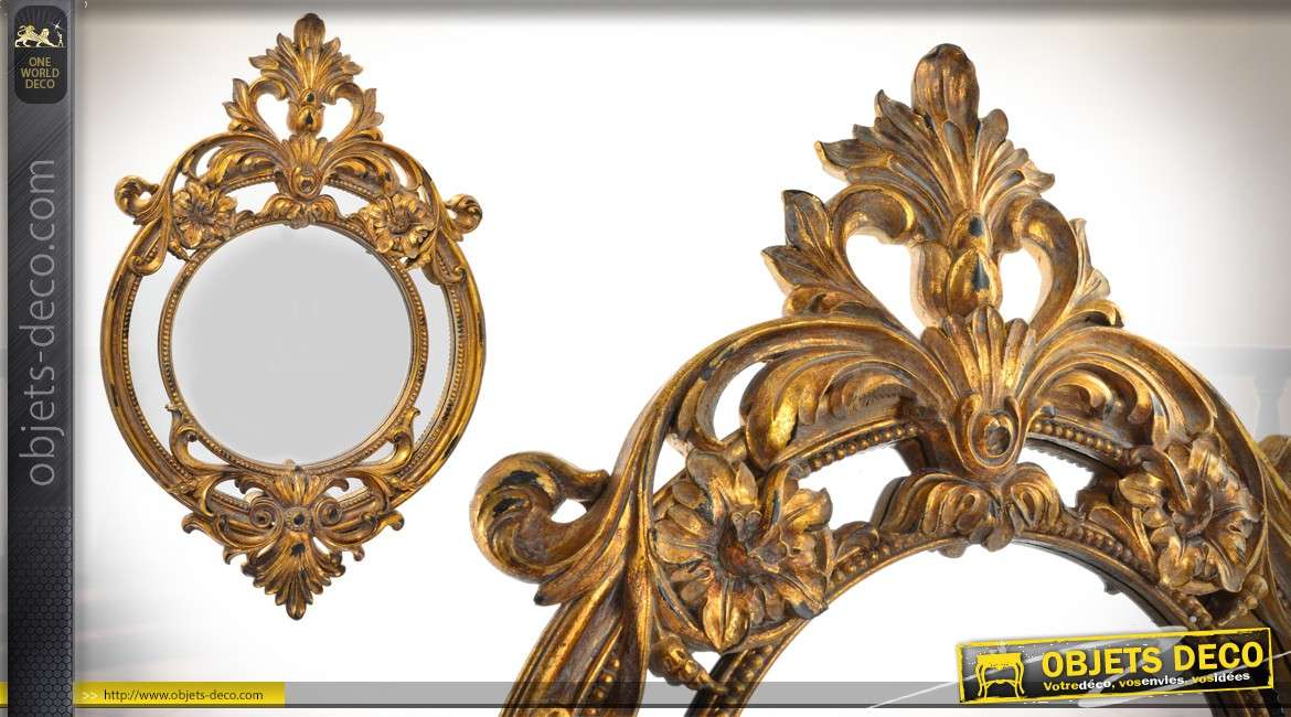 Miroir oval de style baroque patiné vieux doré 61 cm