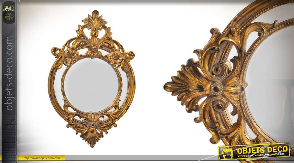Miroir oval de style baroque patiné vieux doré 61 cm