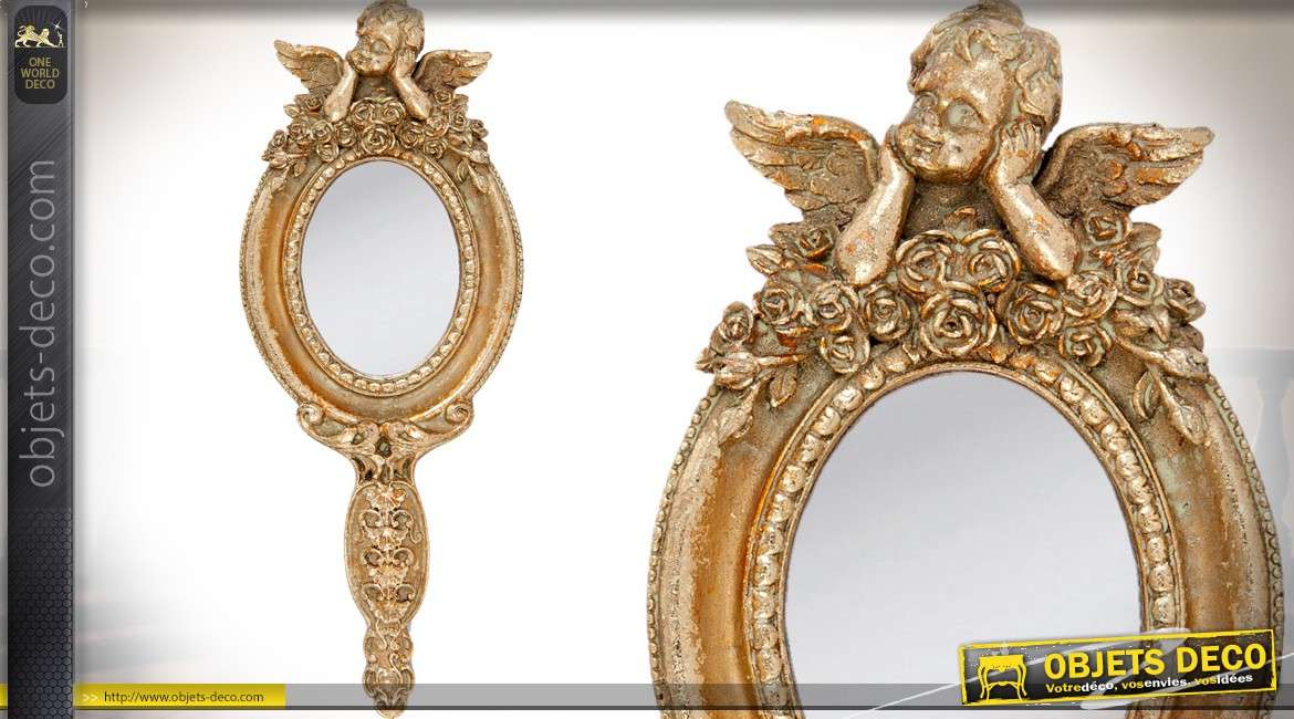 Miroir à main ovale finition dorée et vieilli à motifs d'ange ailé 26 cm