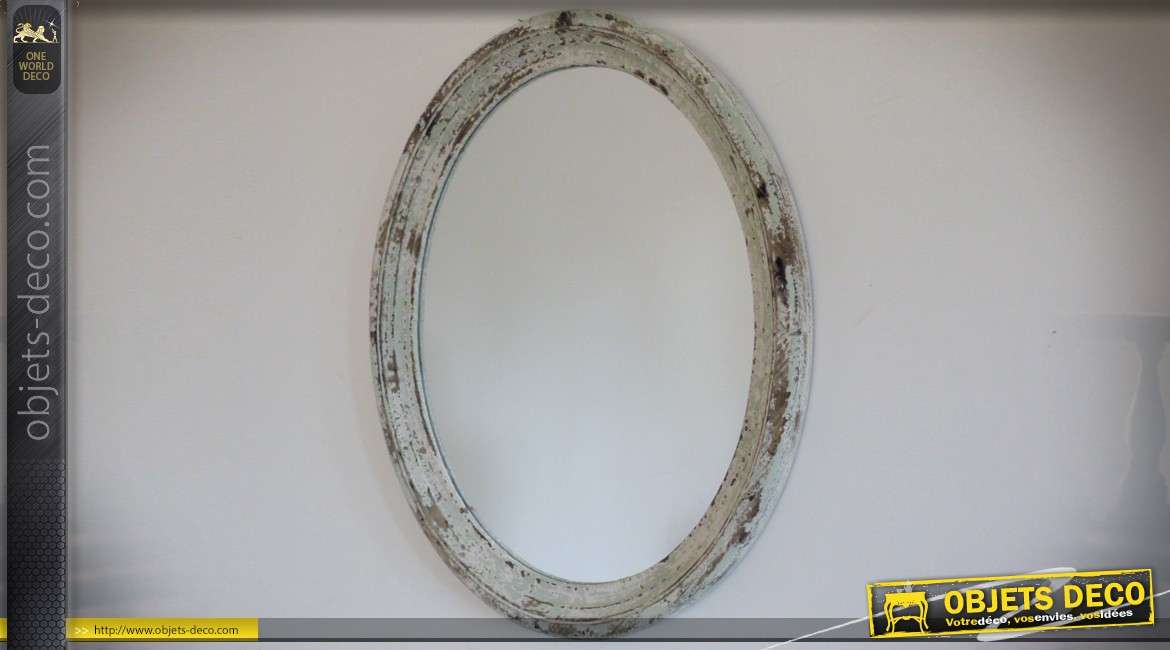 Miroir ovale à encadrement mouluré patine blanche veillie 67 cm