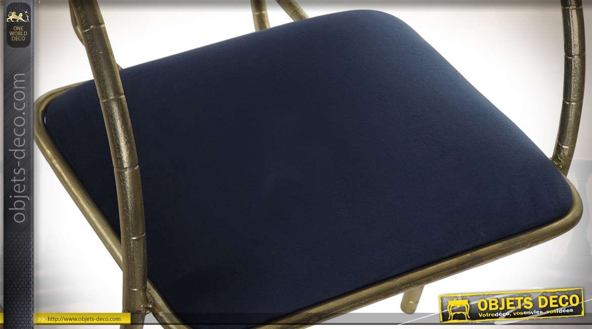 Chaise design en métal doré avec habillage tissu bleu nuit