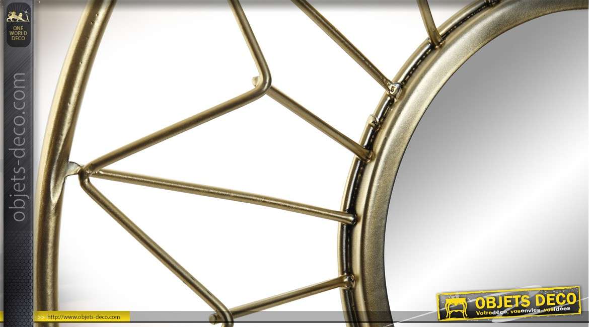 Miroir circulaire avec encadrement étroilé en métal doré Ø 35 cm