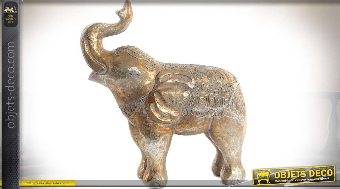 Statuette d'éléphant en bois sculpté finition dorée et vieillie 33 cm