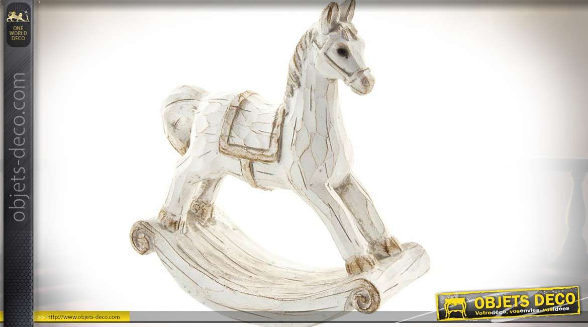 Statuette décorative en forme d'ancien cheval à bascule coloris blanc vieilli