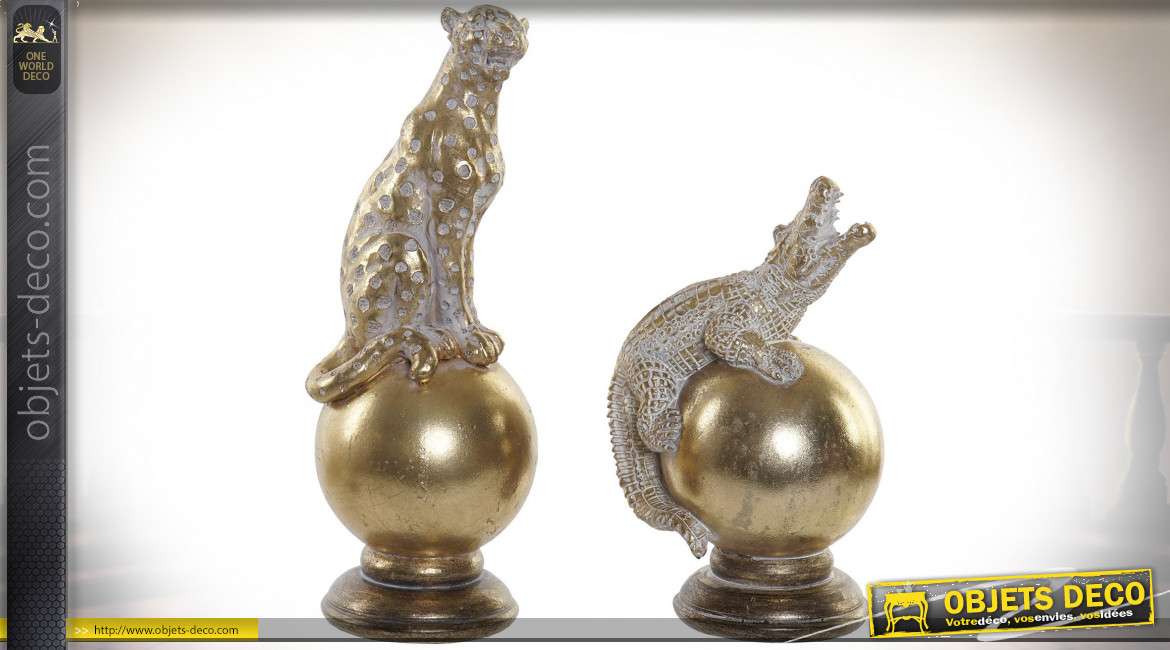 Série de deux décoration à poser en résine, thème animalier avec guépard et crocodile sur sphère, finition vieux doré, 22cm