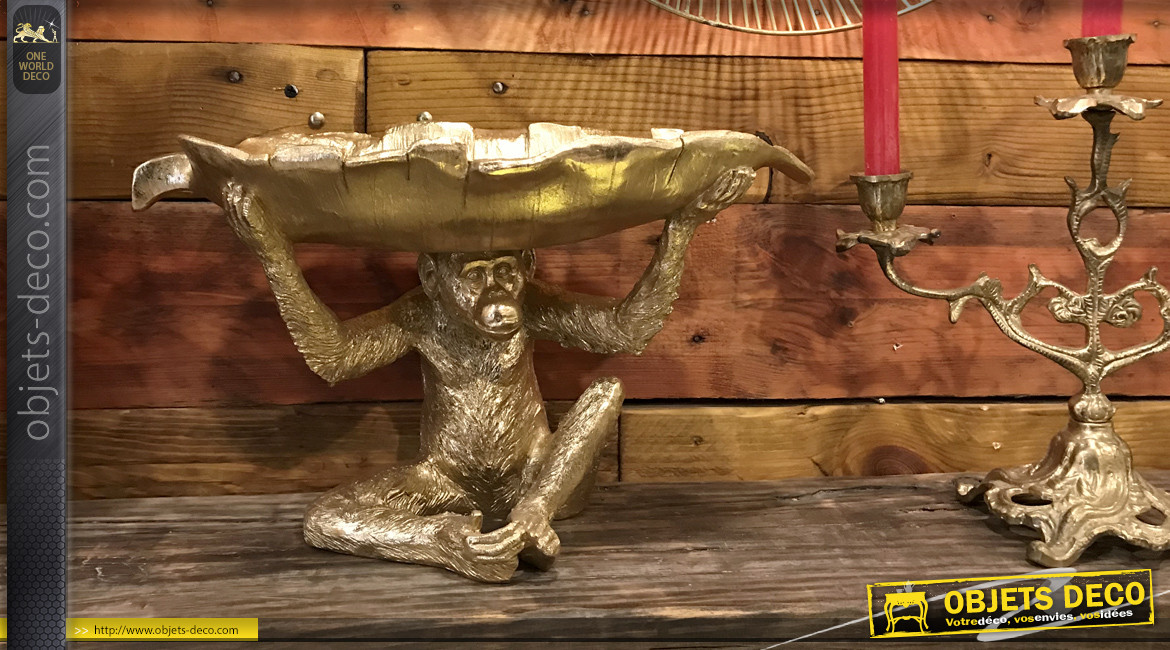 Statuette d'un singe en résine finition dorée brillante avec grande feuille creuse sur la tête esprit vide poche, 38cm