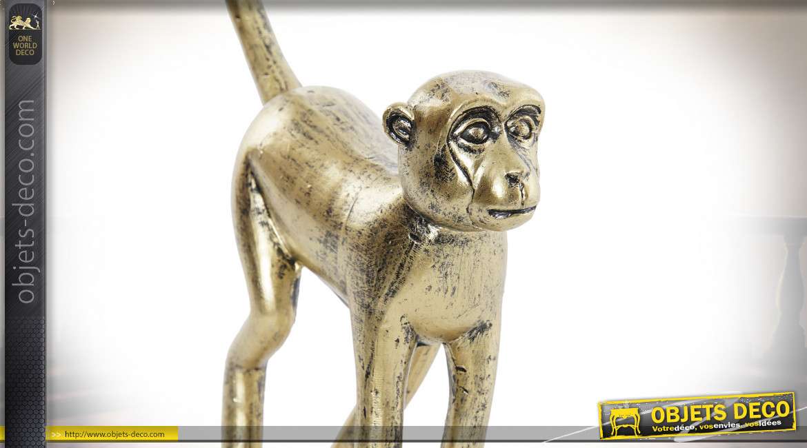 Sculpture de singe en résine finition doré effet vieilli noir, 29cm