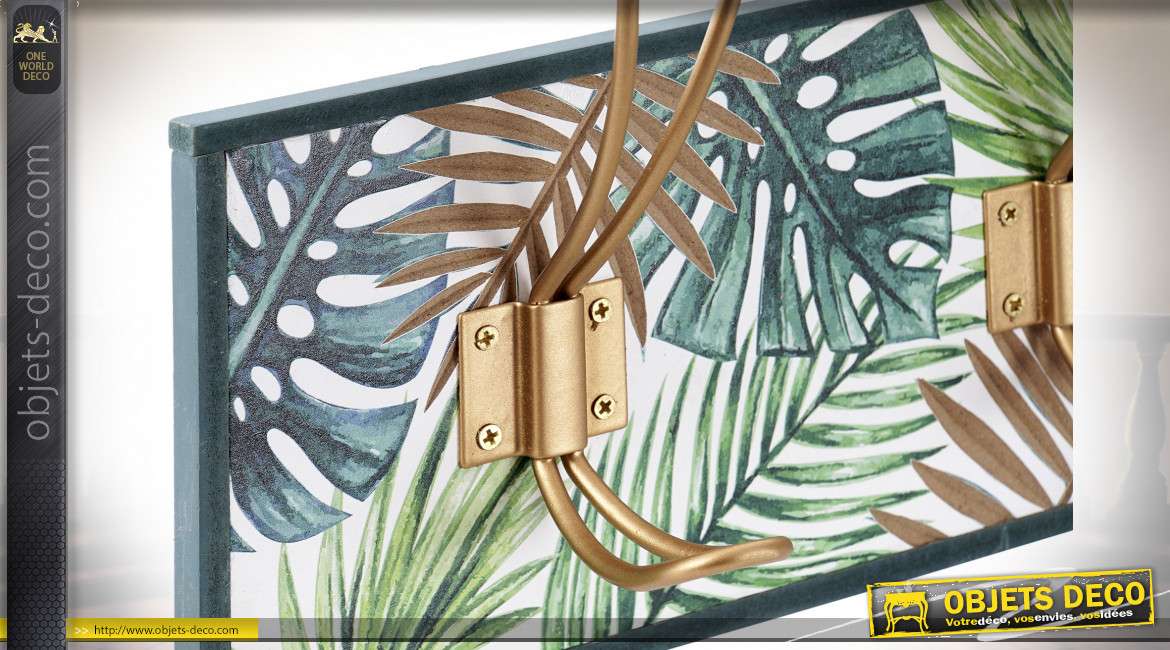 Série de deux portes manteaux en bois et métal, finition dorée sur motifs de feuilles tropicales, 50cm