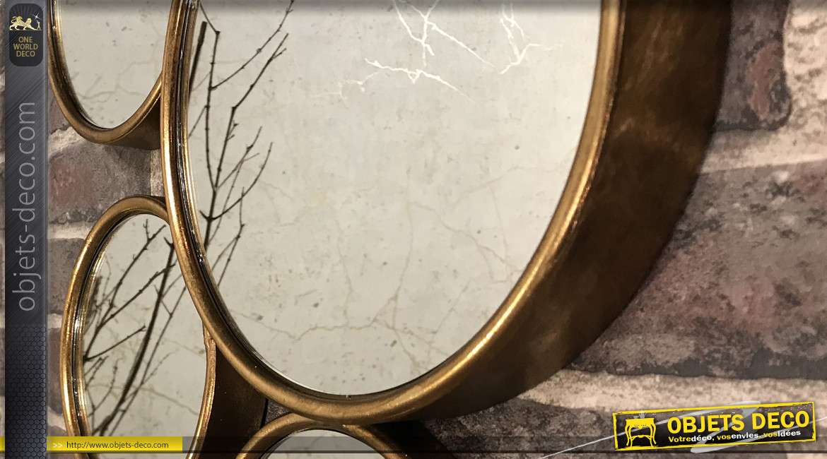 Miroir en métal de style moderne, finition vieux doré composé de 9 ronds de tailles différentes, 91cm de haut