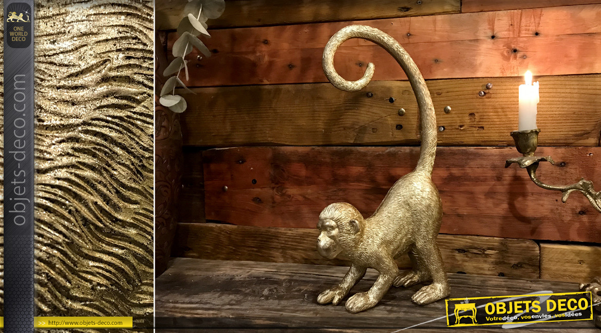 Représentation d'un singe en résine finition dorée, ambiance tropicale chic, 33cm