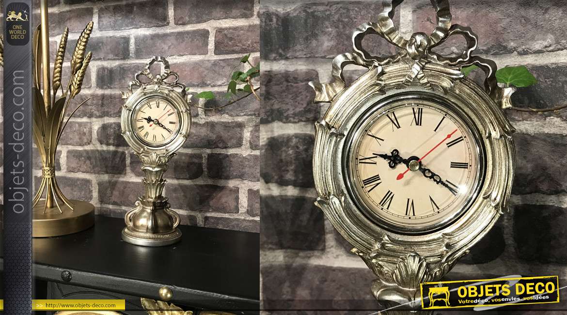 Horloge à poser en résine effet métal argenté vieilli, esprit Walt Disney inspirations baroques, 31cm