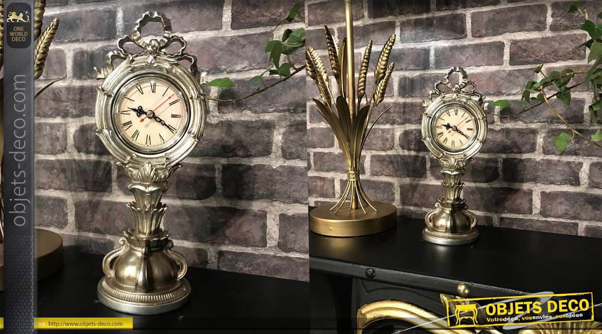 Horloge à poser en résine effet métal argenté vieilli, esprit Walt Disney inspirations baroques, 31cm
