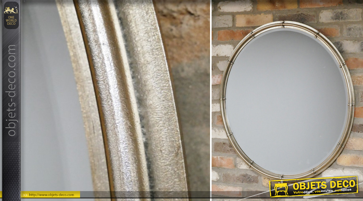 Grand miroir rond de Ø80cm avec encadrement en métal ambiance atelier de fabrication, finition inox brossé