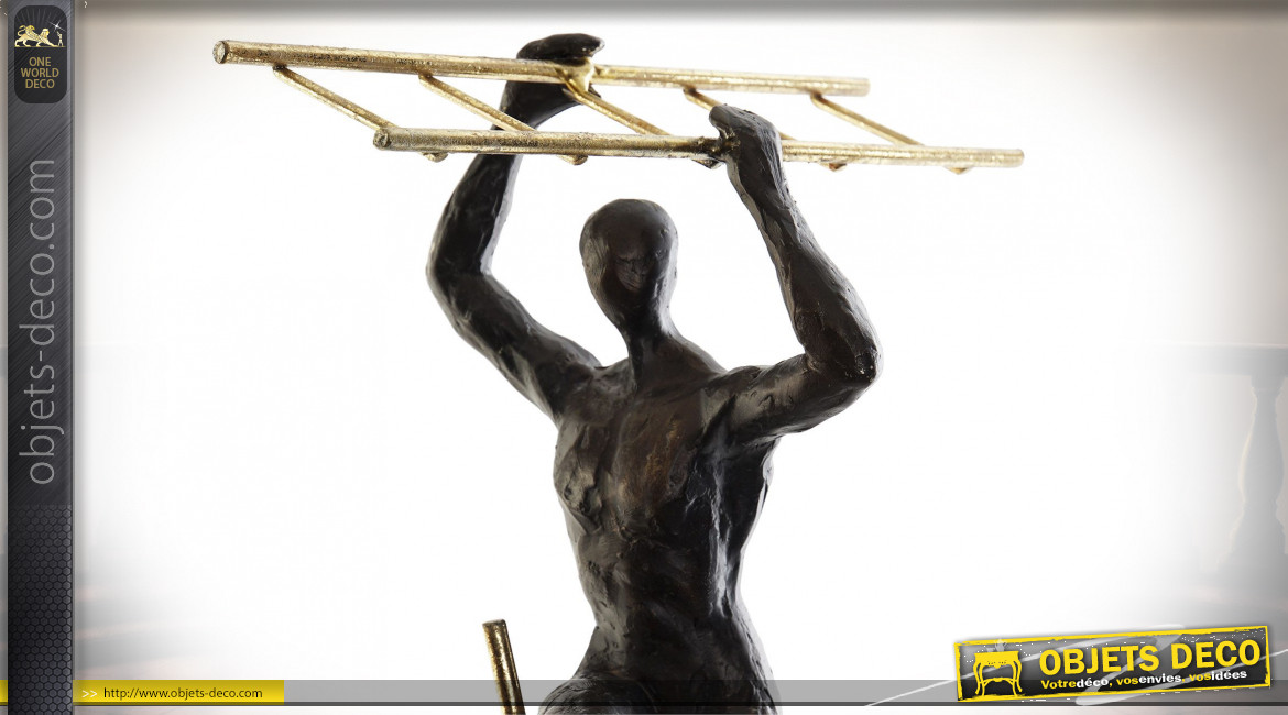 Statuette de deux acrobates en résine finition noire et dorée, 70cm