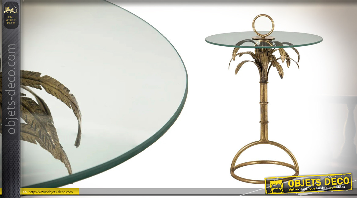 Table d'appoint en métal et verre, ambiance coloniale avec feuilles de palmiers, finition vieux doré, 70cm