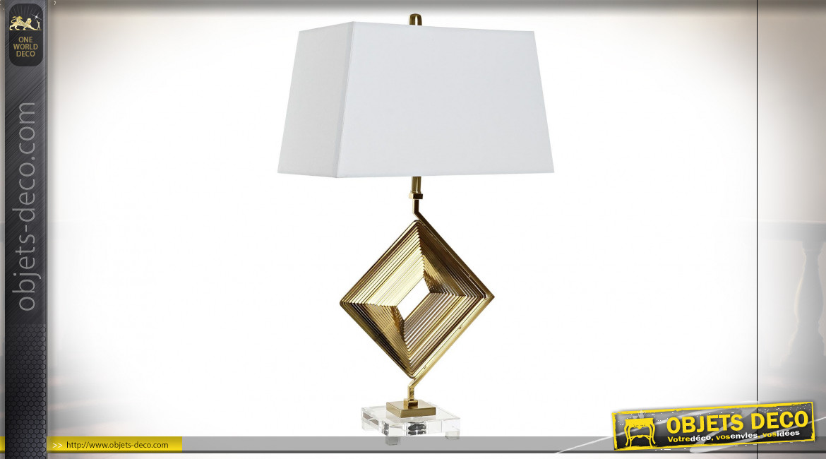 Grande lampe à poser en verre transparent et métal finition dorée ambiance moderne design, 75cm