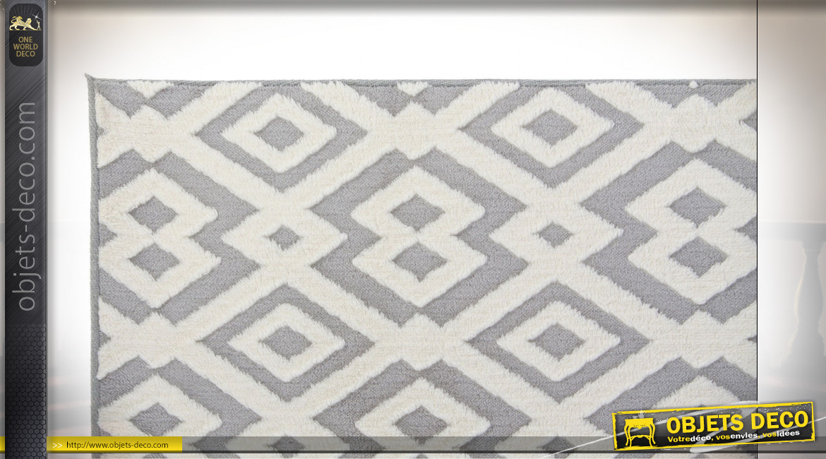 Grand tapis rectangulaire aux motifs géométriques en polyester finition gris souris et blanc ambiance contemporaine, 290cm