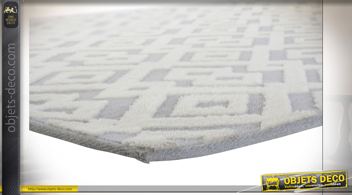 Grand tapis rectangulaire aux motifs géométriques en polyester finition gris souris et blanc ambiance contemporaine, 290cm
