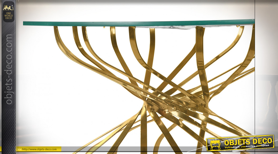 Table basse en métal ajouré finition dorée et plateau en verre transparent de style moderne chic, Ø 81cm