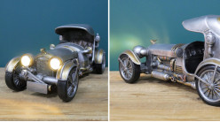 Représentation résine d'une voiture ancienne de style steampunk, avec phares, finition gris et laiton doré, 33cm