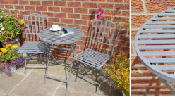 Salon de jardin pour 2 personnes en métal finition gris ancien, table ronde et chaises effet barreaux, Ø60cm