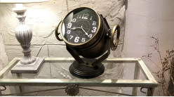 Horloge style ancien projecteur de bateau, en métal finition laiton brillant, 34cm