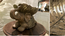 Sculpture en résine d'un éléphant finition marron et doré effet ancien, ambiance souvenirs de voyage, 31 cm