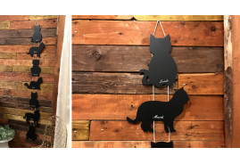 Ensemble de 7 tableaux noirs en formes de silhouettes de chats.