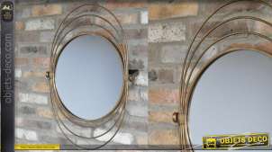 Miroir en métal de style moderne, modèle dit Saturne avec encadrement en anneaux, inclinable