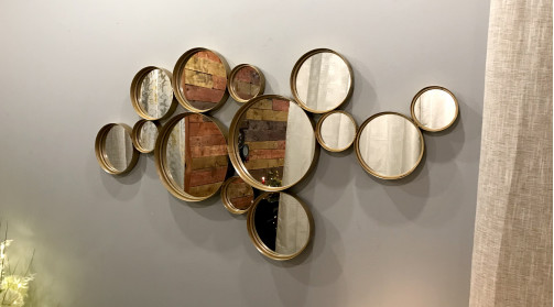Décoration murale ensemble de miroirs de forme ronde, tailles variées, coloris vieux doré.