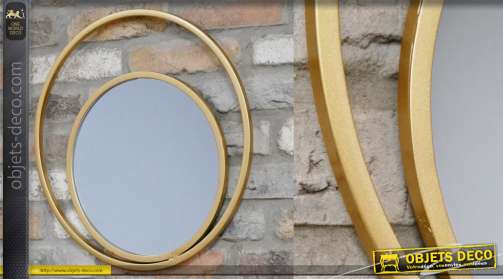 Miroir en métal de forme circulaire, encadrement moderne